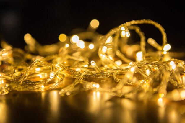 Close-up of illuminated string lights on table