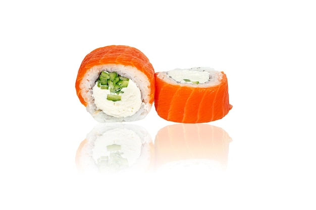 Close up image of classic philadelphia sushi rolls with salmon cheese and cucumber isolated on white