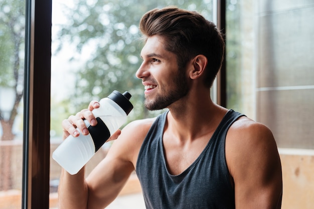 Close up image of model in gym