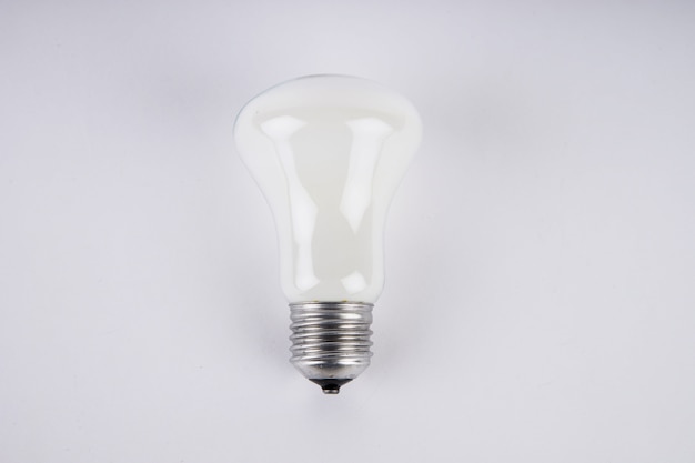 Close up on incandescent light bulb isolated