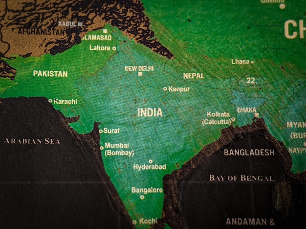 Photo close up of a india word on a world map