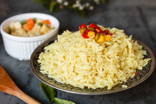 Close-up indian rice with salad