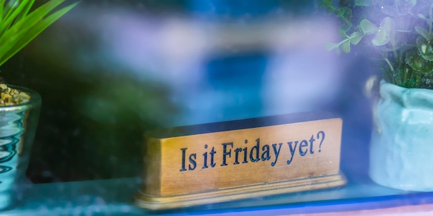 Close-up of information sign on table