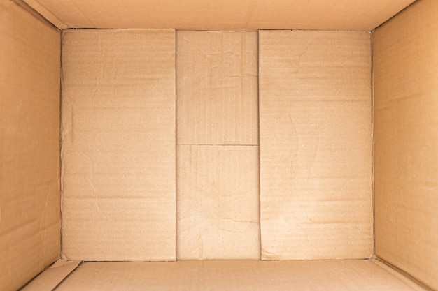 Close up inside of brown cardboard box background and texture