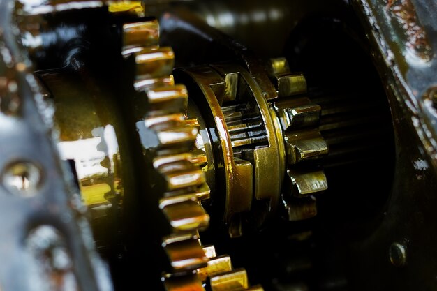 Close up internal engine gear tractor. Engine walking tractor.