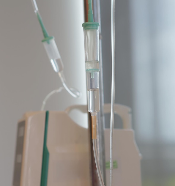 Photo close-up of iv drip at hospital