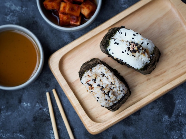Close-up of japanese rice ball on cutting board
