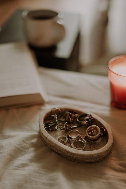 Close-up of jewelry on the bed