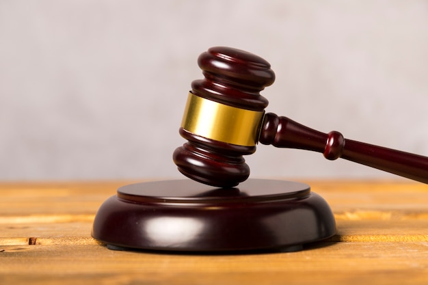 Close-up judge gavel with wooden stand