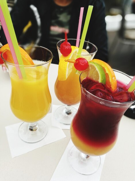 Close-up of juice and drink on table