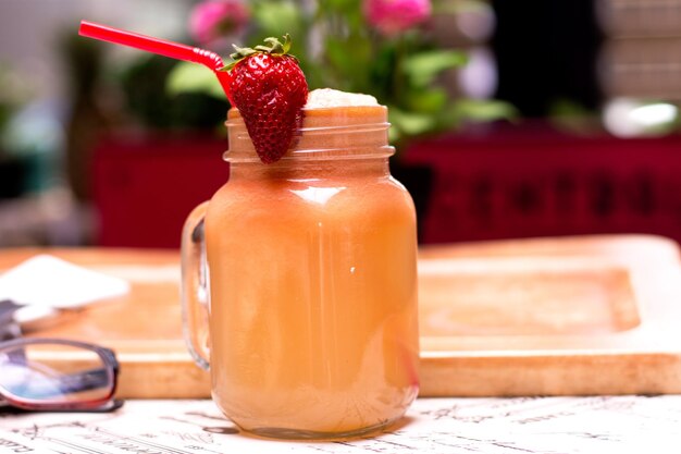 Close-up of juice in glass on table