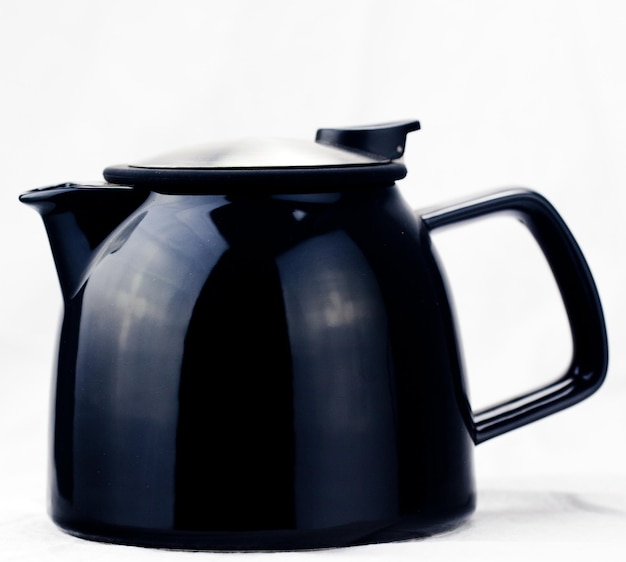 Photo close-up of kettle against white background