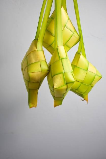 Close up Ketupat and copy space with isolated white background Traditional culture in indonesia wel