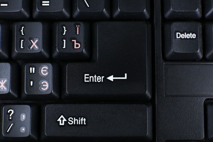 Photo close up of keyboard of modern laptop