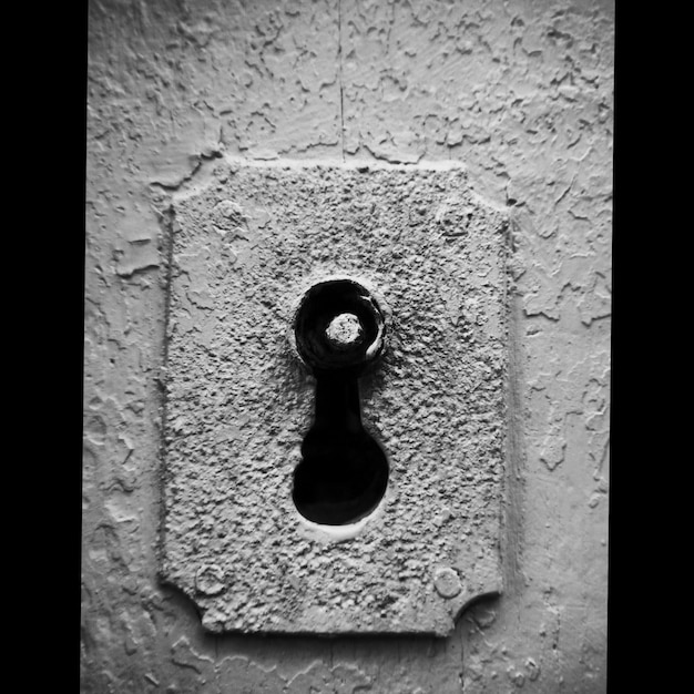 Close-up of keyhole on old door