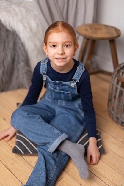 Close up on kid in their room having fun