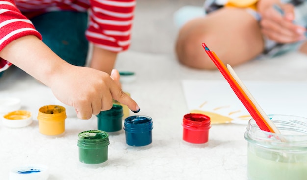 Close-up kids painting