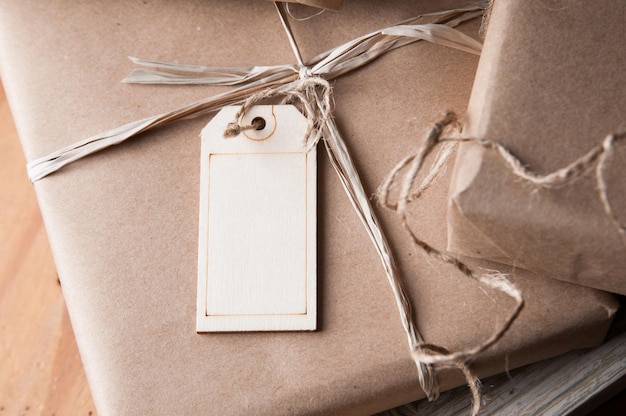 Photo close-up of label with brown wrapped parcel