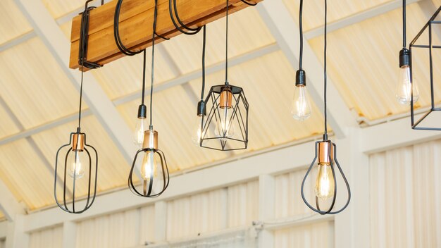 Close up of the lamp hanging from a ceiling.