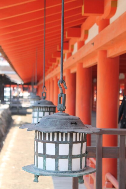 Photo close-up of  lantern against building