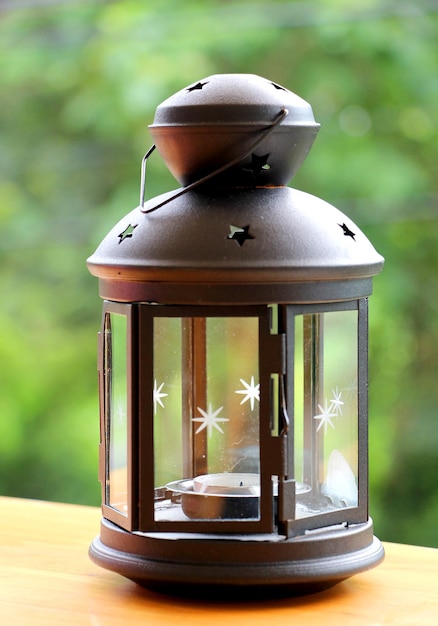 close-up of lantern on table