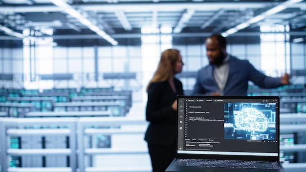 Close up of laptop with AI technology used to sustain data center hardware