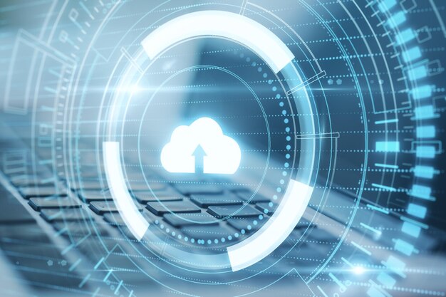 Close up of laptop with creative glowing blue clouds hologram on dark background Cloud computing and database concept Double exposure