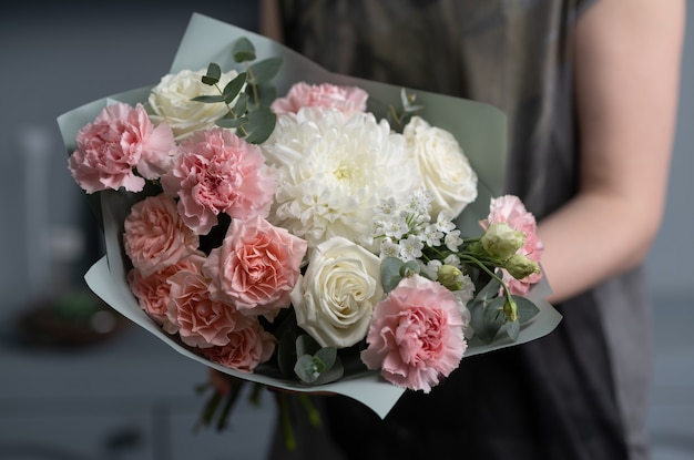 Close-up Large Beautiful bouquet of mixed flowers. Flower and Wallpaper. Floral shop concept . Beautiful fresh cut bouquet. Flowers delivery