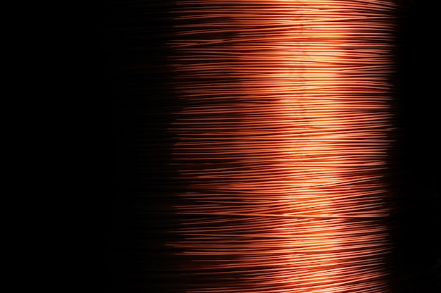 Close-up large coil of thin copper wire