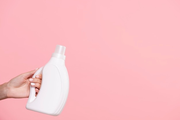 Photo close-up laundry detergent with pink background