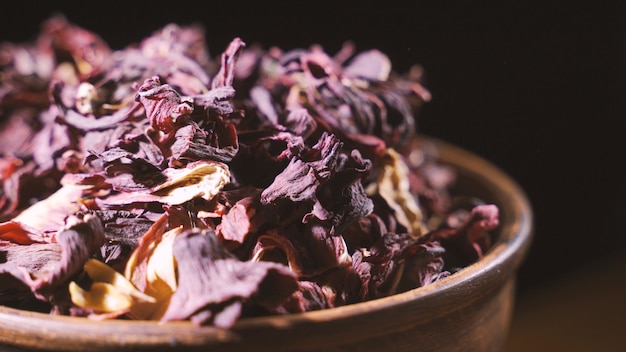 Close up leaves of hibiscus dried in a bowl