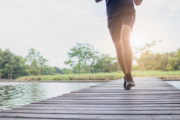 Close up legs of man running and exercising