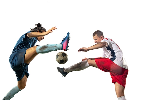 Close up legs of professional soccer, football players fighting for ball