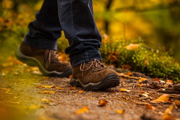 Close up of legs walking in narrow walkway