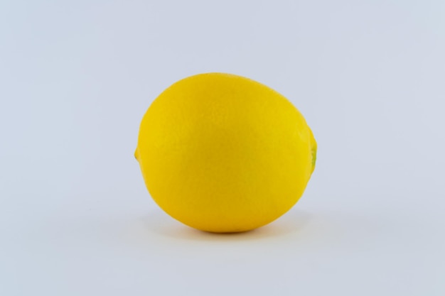 close-up of lemon against white background