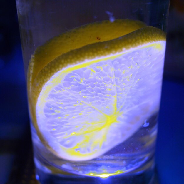 Close-up of lemon in drink