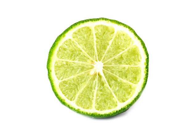 Photo close-up of lemon slice against white background