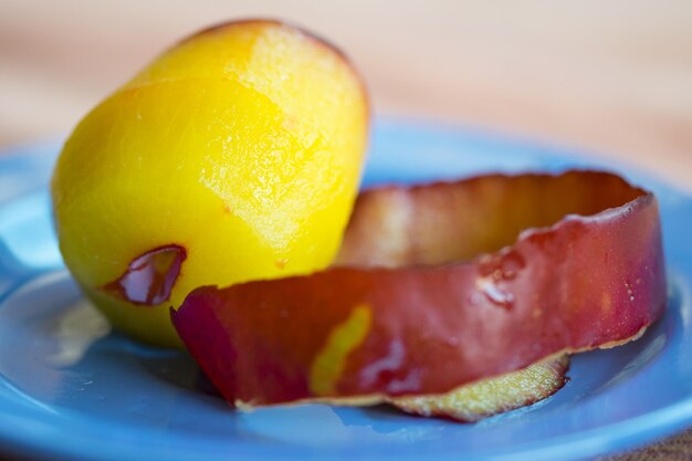 Close-up of lemon slice in plate