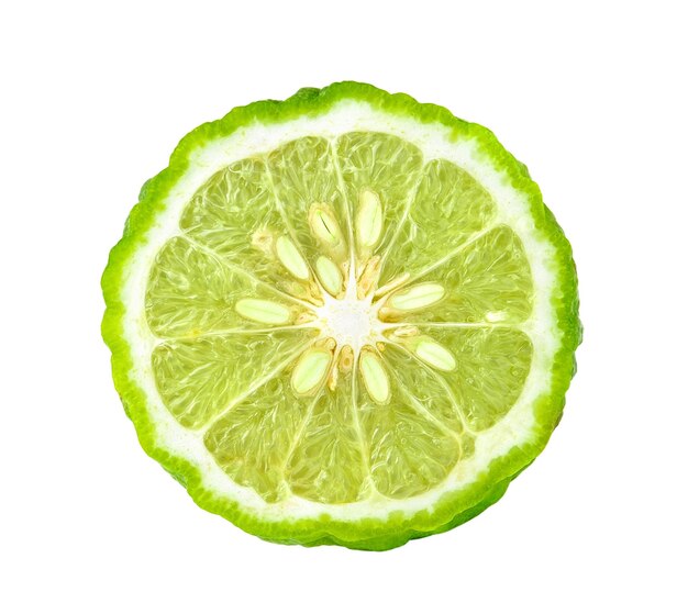 Close-up of lemon slice over white background