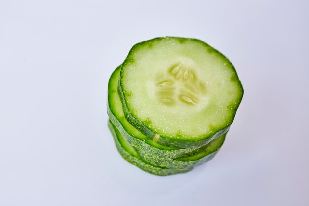 Close-up of lemon slice over white background