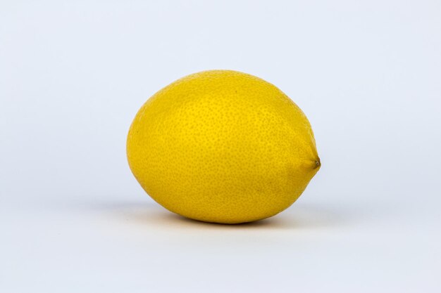 close-up of lemon slice on white background