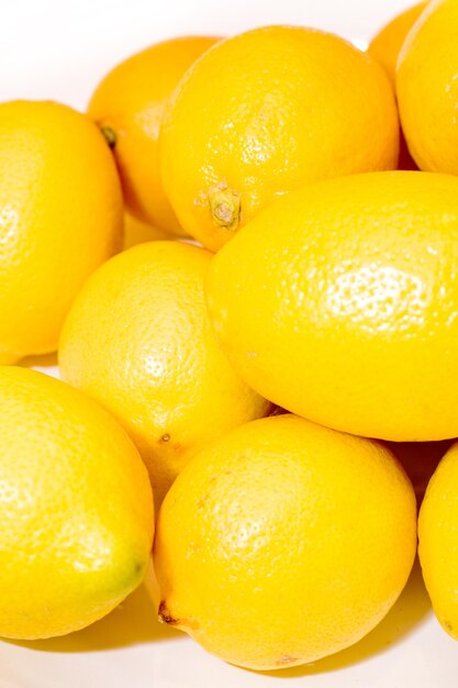 Close-up of lemon slice on wooden table