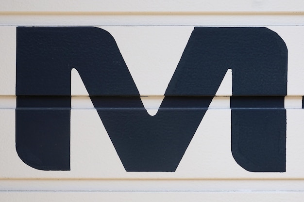 Photo close-up of letter m painting on wall