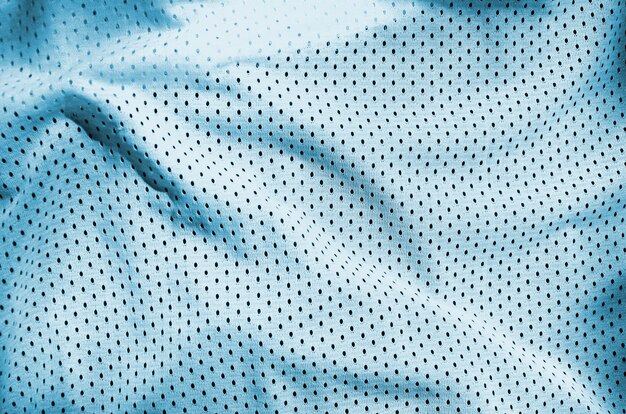 Close up of light blue polyester nylon sportswear shorts to created a textured background