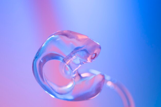 Close-up of light bulb against blue background