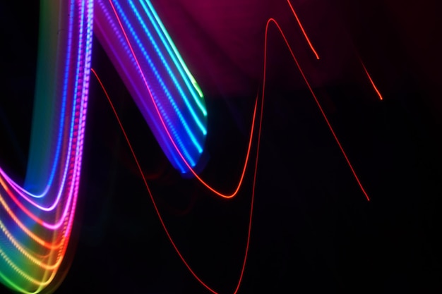 Close-up of light painting against black background