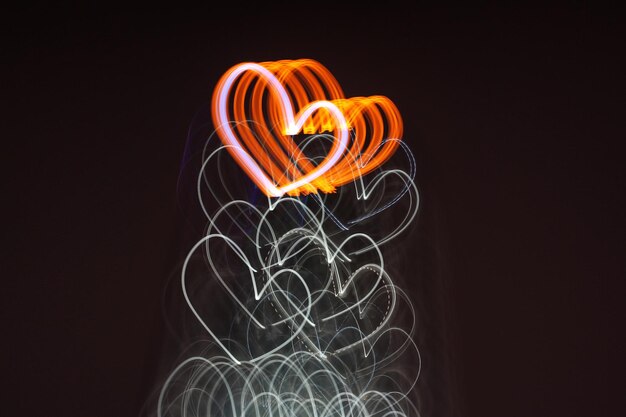 Photo close-up of light painting against black background