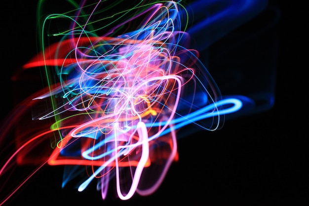 Photo close-up of light painting against black background