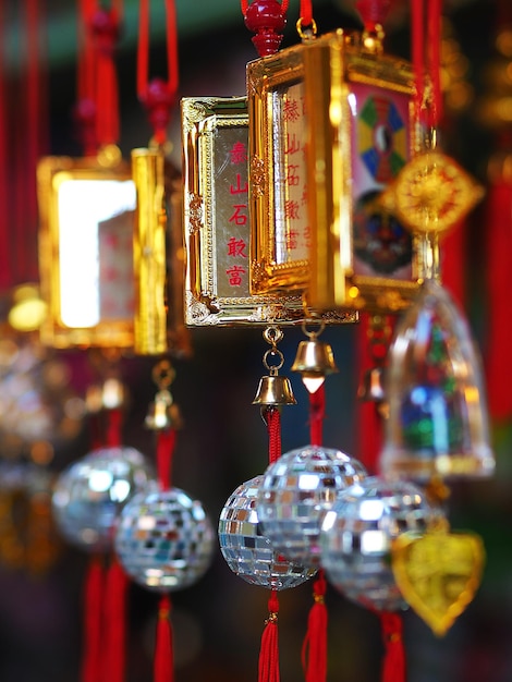 Close-up of lit candles in temple