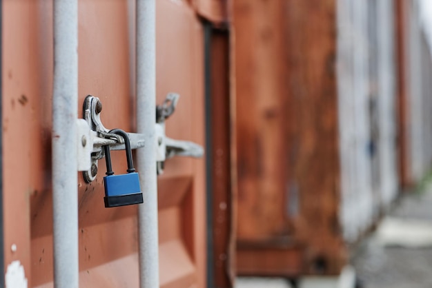 Photo close up of lock on door of cargo container in docks copy space